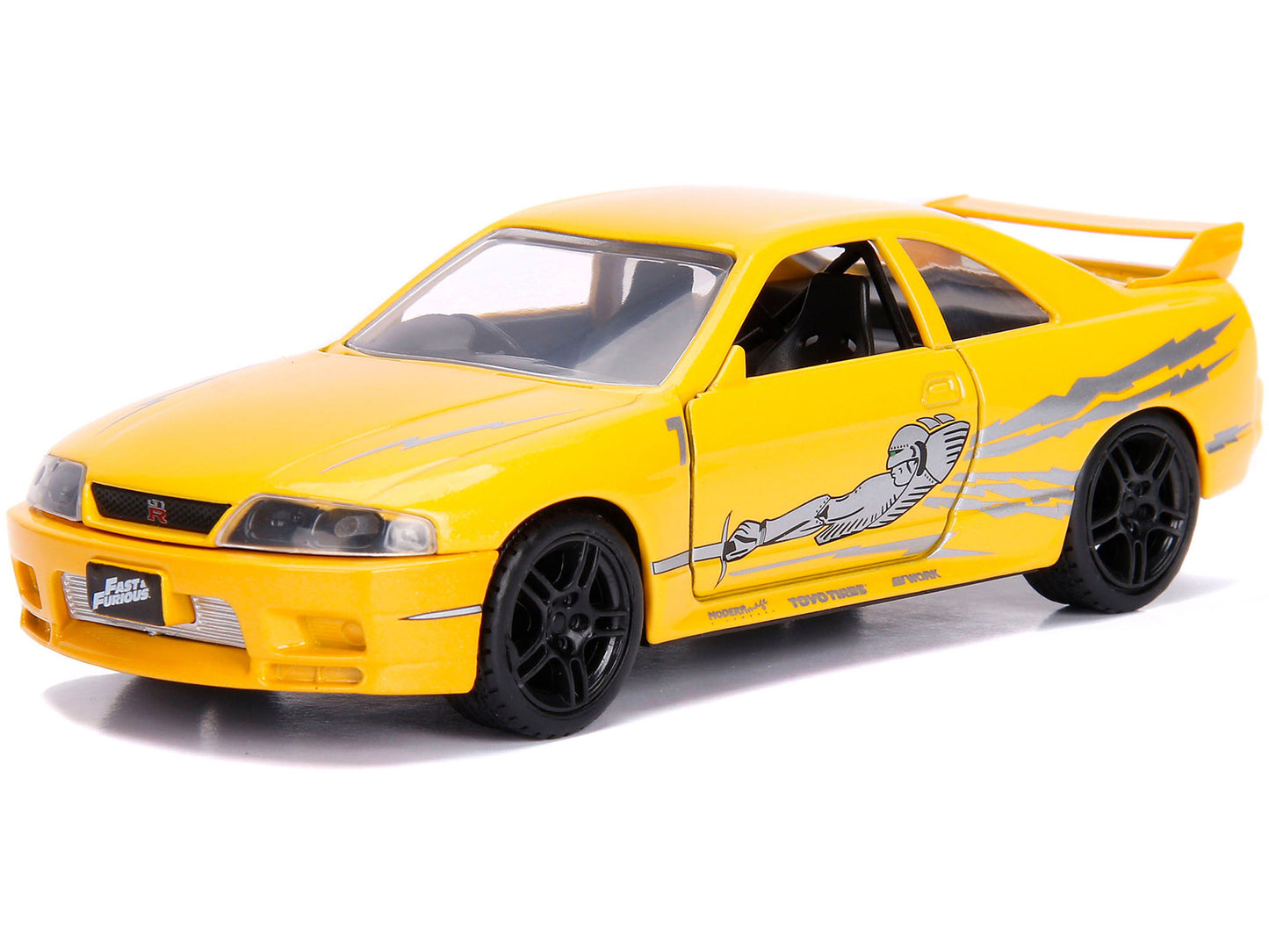 Leon's Nissan Skyline GT-R (BCNR33) Yellow Metallic with Graphics "Fast & Furious" Series 1/32 Diecast Model Car by Jada-DiecastModeler.com