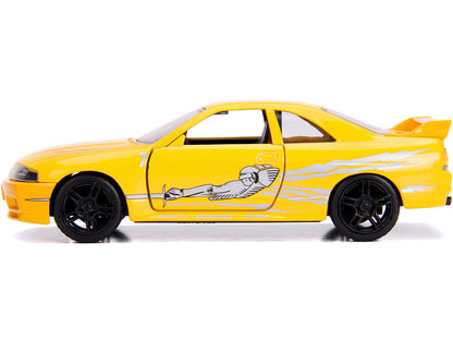 Leon's Nissan Skyline GT-R (BCNR33) Yellow Metallic with Graphics "Fast & Furious" Series 1/32 Diecast Model Car by Jada-DiecastModeler.com