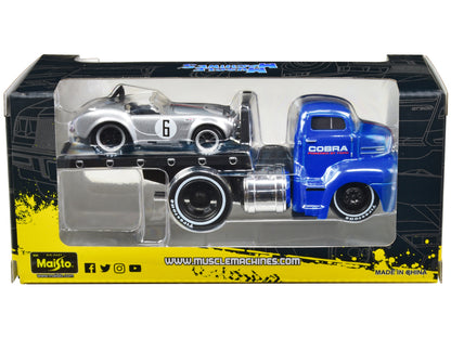 1950 Ford COE Flatbed Truck Blue "Cobra Powered by Ford" and 1964 Shelby Cobra #6 Silver Metallic with Stripes "Muscle Transports" Series 1/64 Diecast Model Cars by Muscle Machines