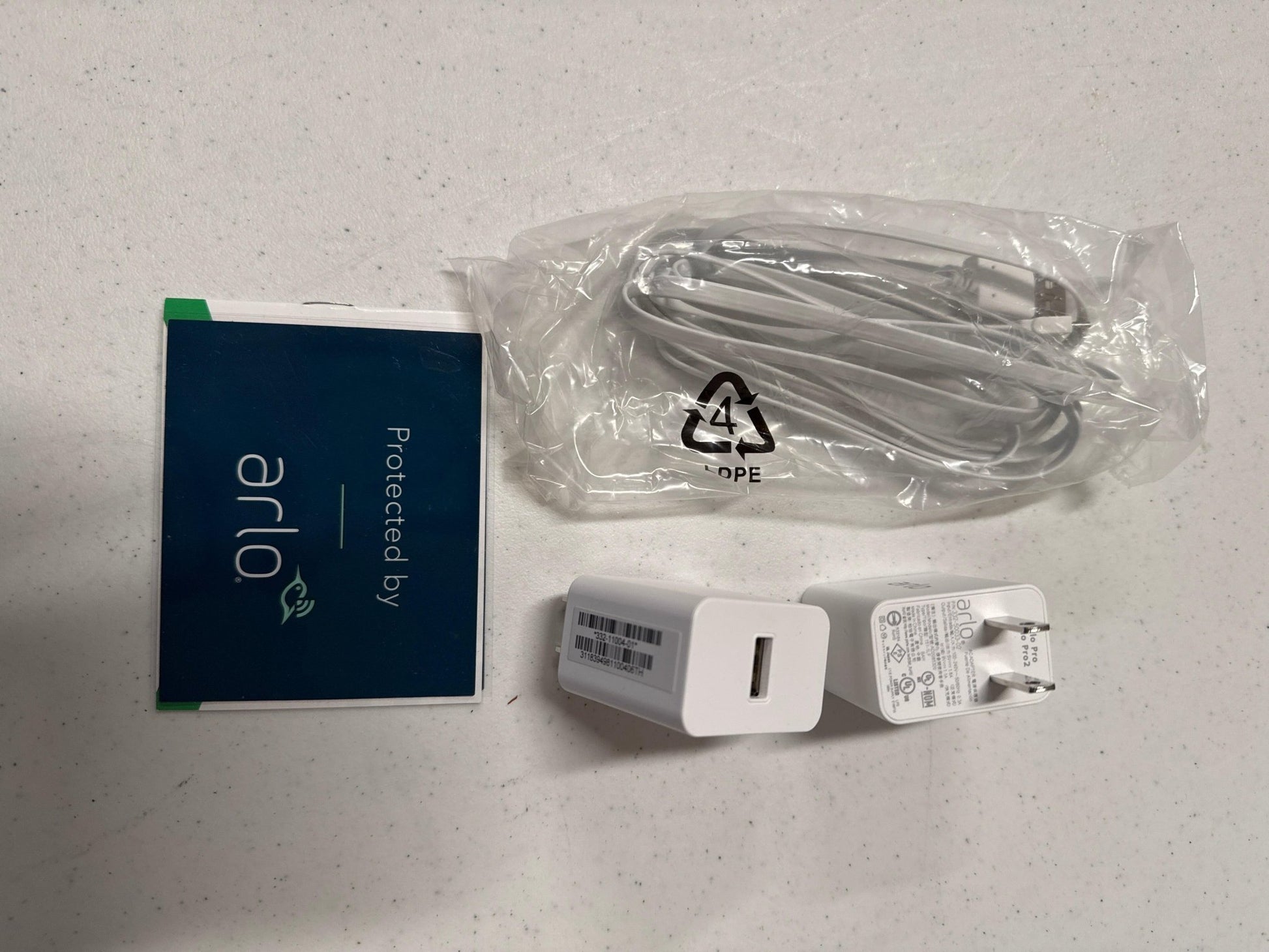 Netgear Arlo charging cable and plug-DiecastModeler.com