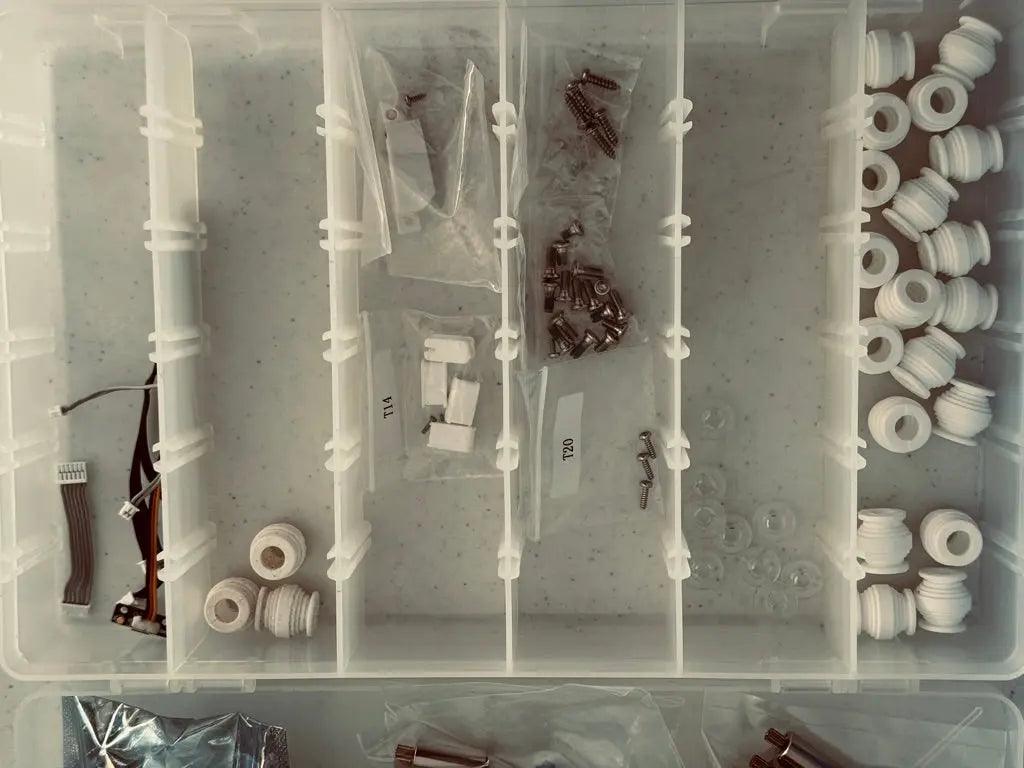 Organizer storage boxes with drone accessories-DiecastModeler.com