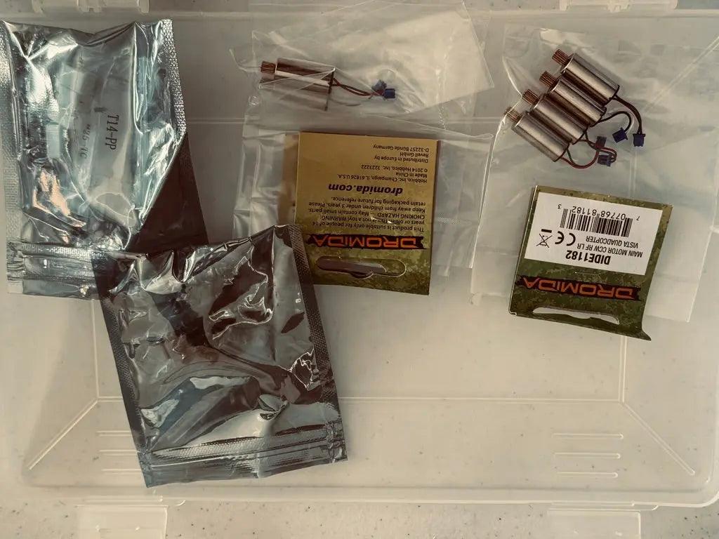 Organizer storage boxes with drone accessories-DiecastModeler.com