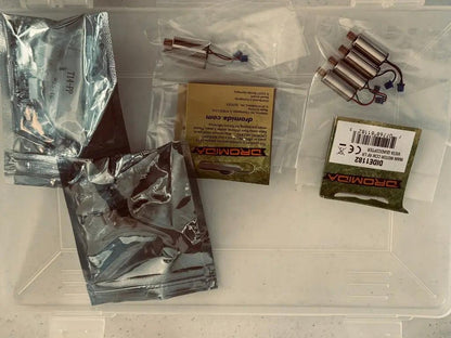 Organizer storage boxes with drone accessories-DiecastModeler.com