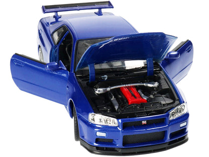 Nissan Skyline GT-R (R34) RHD (Right Hand Drive) Blue Metallic "NEX Models" 1/24 Diecast Model Car by Welly